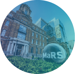 Historic MaRS Centre building with blue sky background and surrounding greenery, representing Canada office